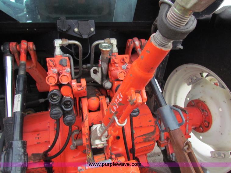 image for item E4123 1999 New Holland TS100 tractor