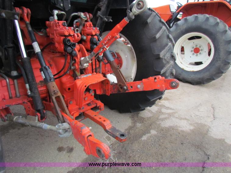 image for item E4123 1999 New Holland TS100 tractor