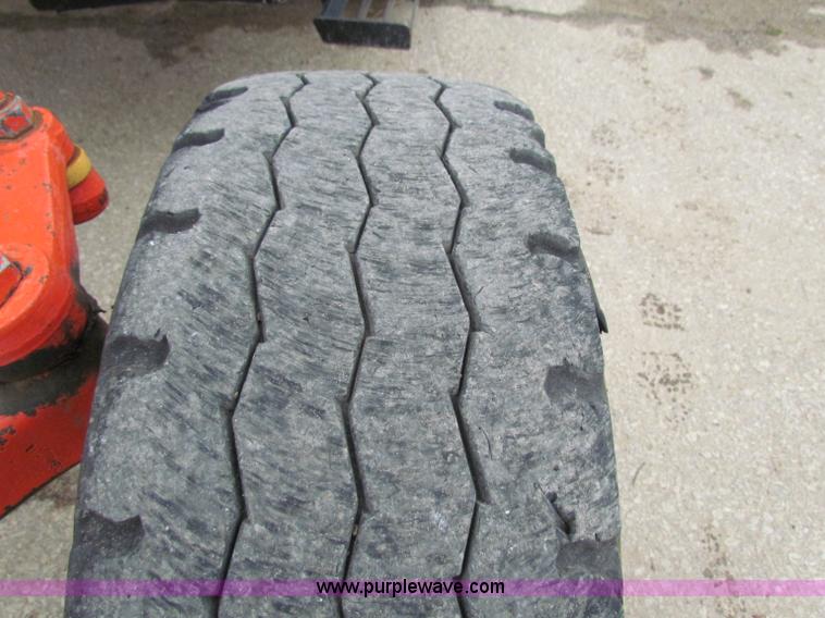 image for item E4123 1999 New Holland TS100 tractor