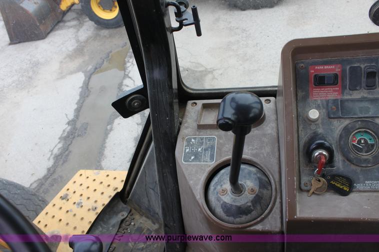 image for item E4146 1998 John Deere 310E backhoe