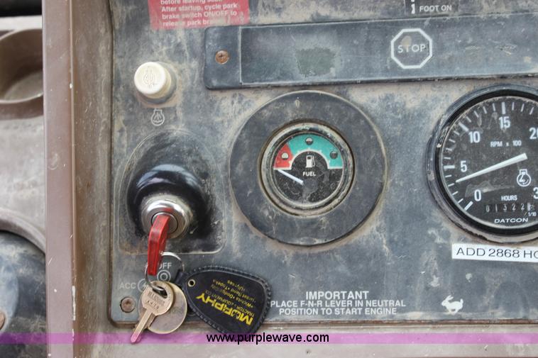 image for item E4146 1998 John Deere 310E backhoe