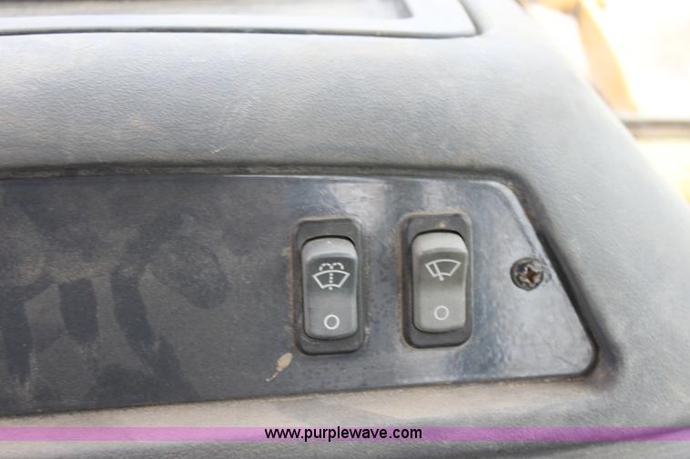 image for item E4147 2004 John Deere 310G backhoe