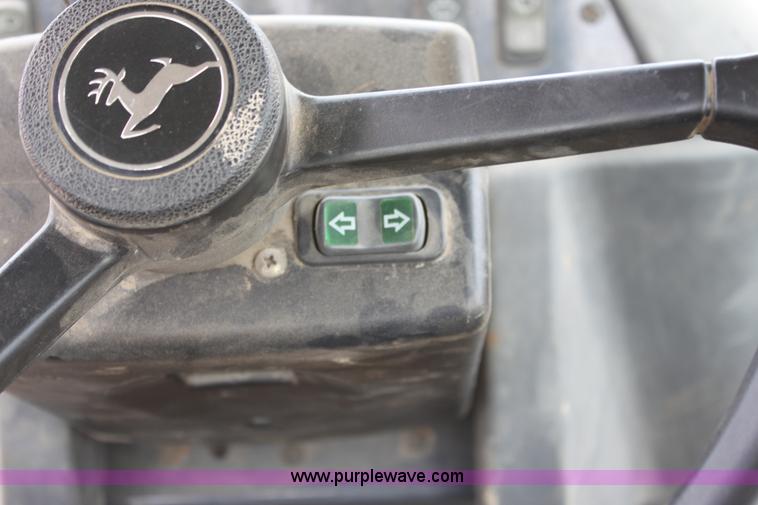 image for item E4147 2004 John Deere 310G backhoe