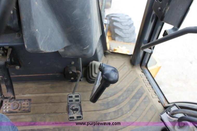 image for item E4147 2004 John Deere 310G backhoe