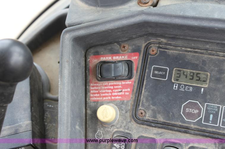 image for item E4147 2004 John Deere 310G backhoe