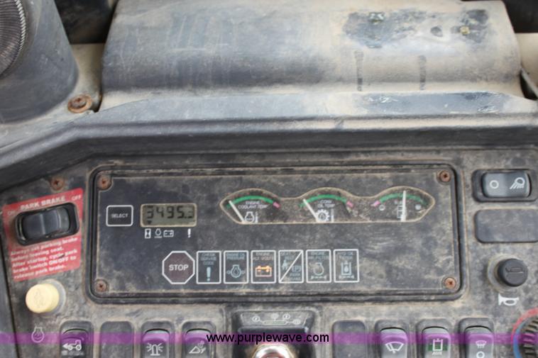 image for item E4147 2004 John Deere 310G backhoe