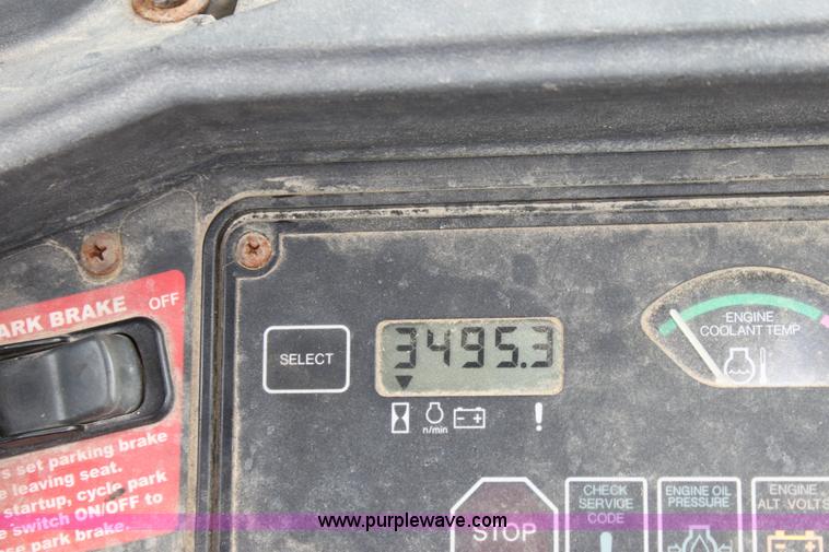 image for item E4147 2004 John Deere 310G backhoe