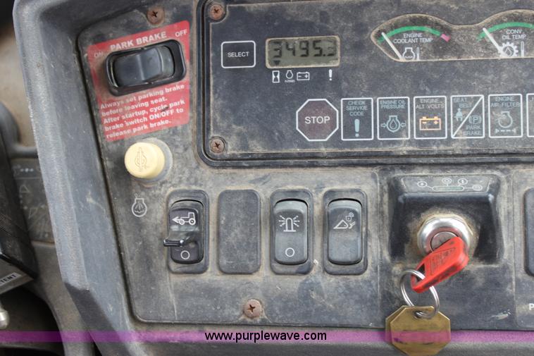 image for item E4147 2004 John Deere 310G backhoe