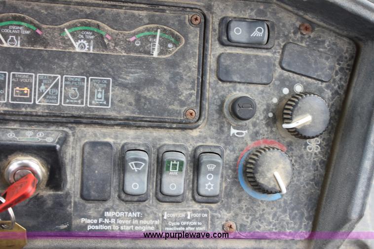 image for item E4147 2004 John Deere 310G backhoe