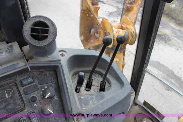 image for item E4147 2004 John Deere 310G backhoe