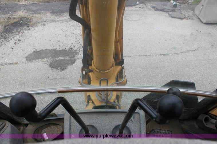 image for item E4147 2004 John Deere 310G backhoe