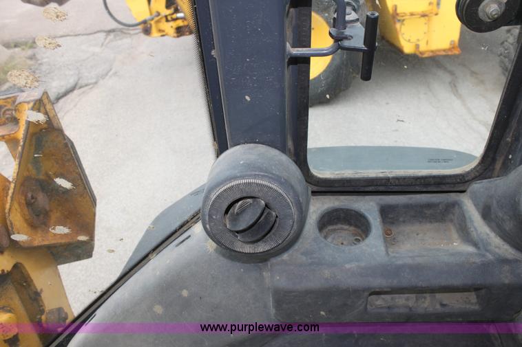 image for item E4147 2004 John Deere 310G backhoe