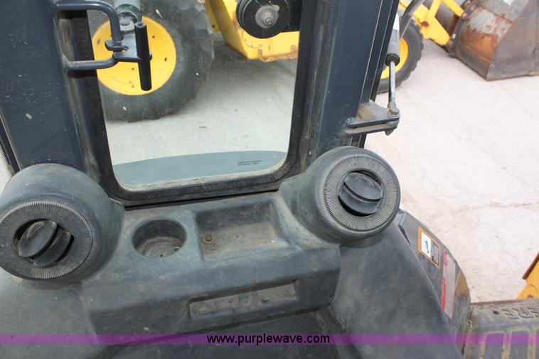 image for item E4147 2004 John Deere 310G backhoe