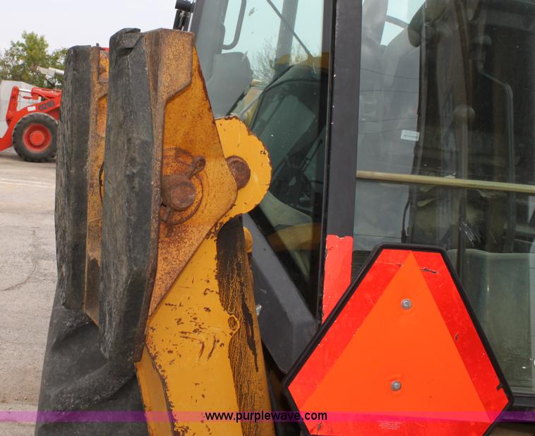 image for item E4147 2004 John Deere 310G backhoe