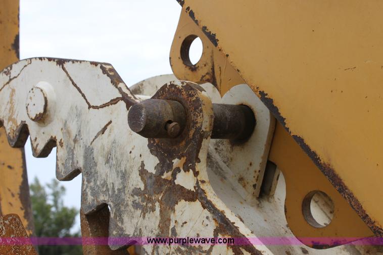 image for item E4147 2004 John Deere 310G backhoe