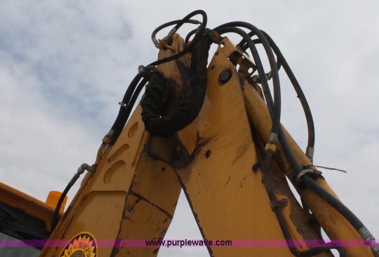 image for item E4147 2004 John Deere 310G backhoe