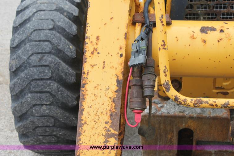 image for item E4147 2004 John Deere 310G backhoe
