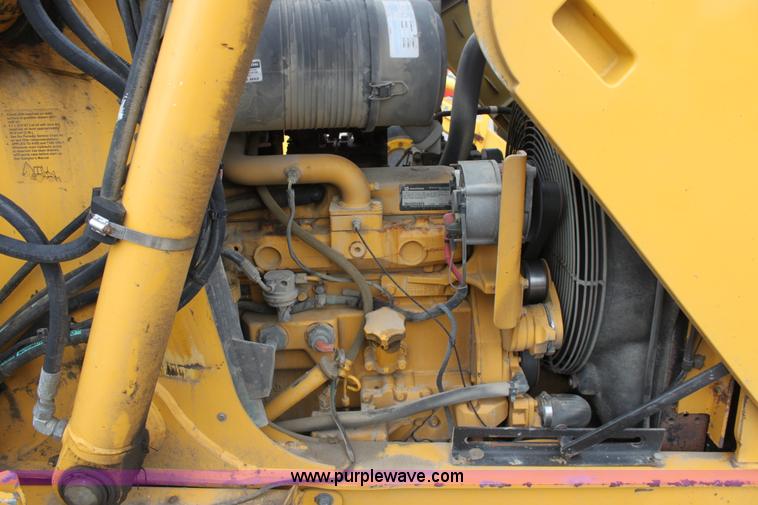 image for item E4147 2004 John Deere 310G backhoe