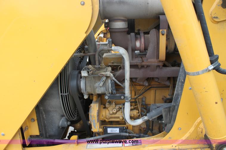 image for item E4147 2004 John Deere 310G backhoe