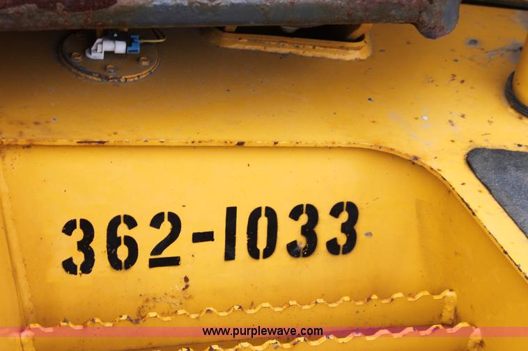 image for item E4147 2004 John Deere 310G backhoe