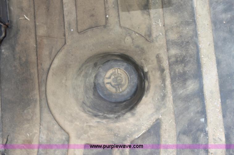 image for item E4147 2004 John Deere 310G backhoe