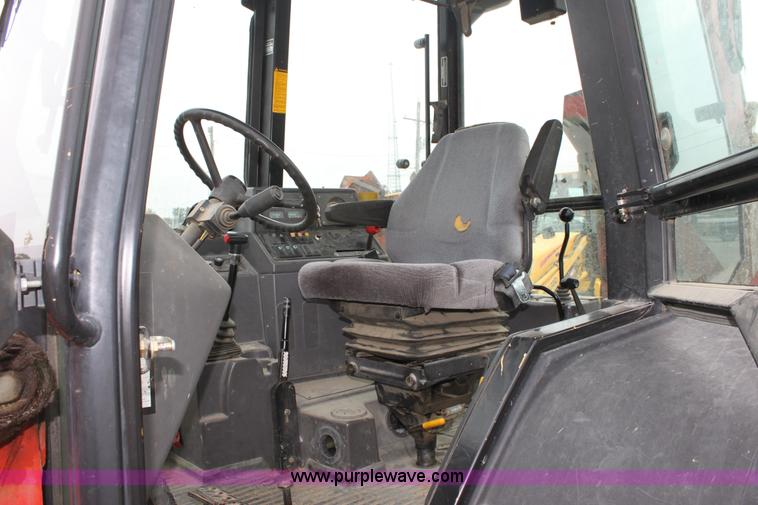 image for item E4149 1996 Ford 555D backhoe