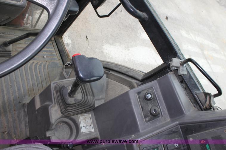 image for item E4149 1996 Ford 555D backhoe