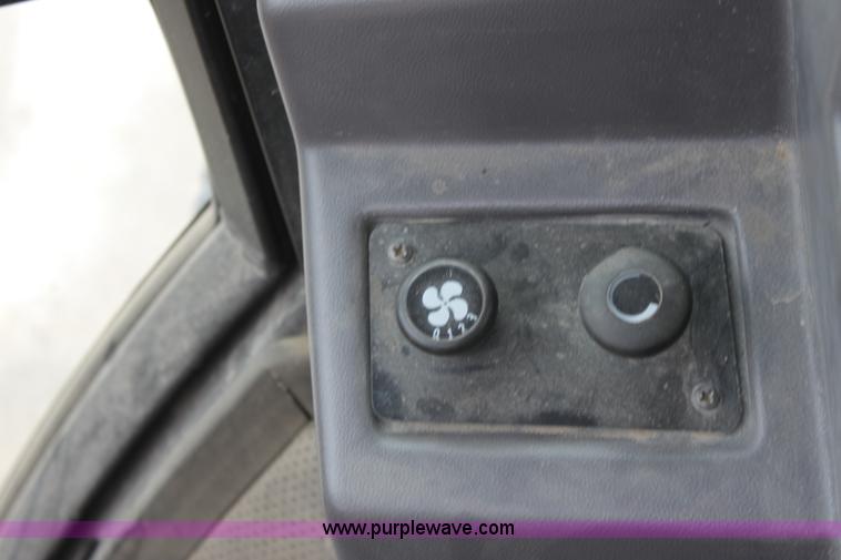 image for item E4149 1996 Ford 555D backhoe