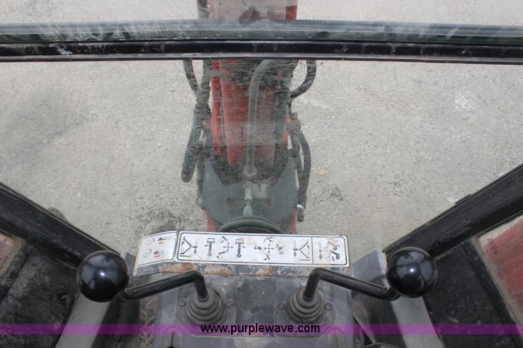 image for item E4149 1996 Ford 555D backhoe