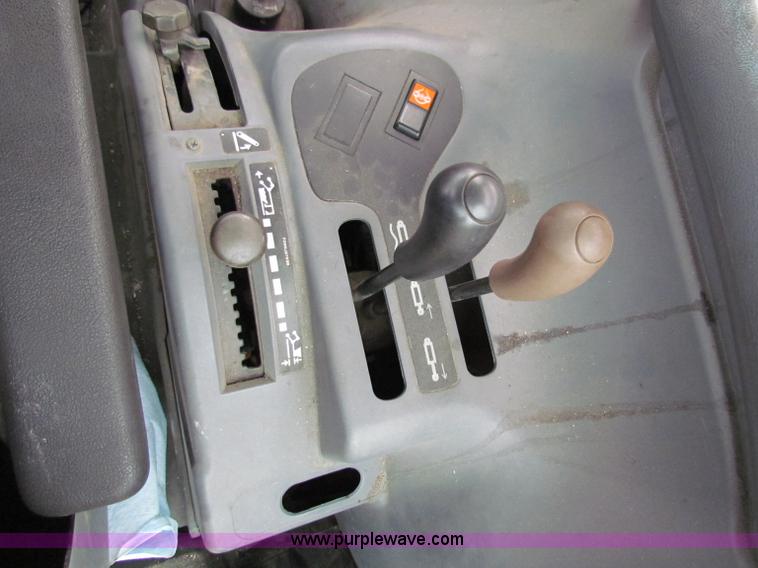 image for item E4150 2000 New Holland TS100 tractor