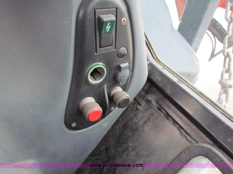 image for item E4150 2000 New Holland TS100 tractor