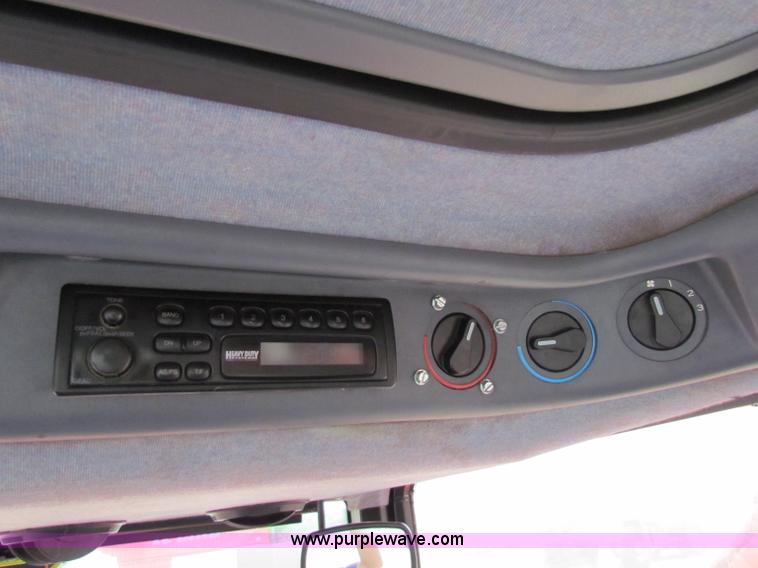 image for item E4150 2000 New Holland TS100 tractor