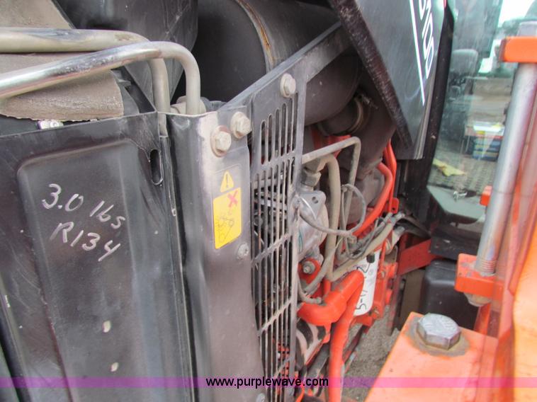 image for item E4150 2000 New Holland TS100 tractor