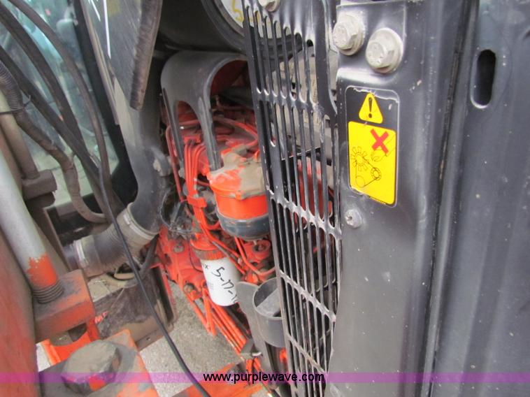 image for item E4150 2000 New Holland TS100 tractor