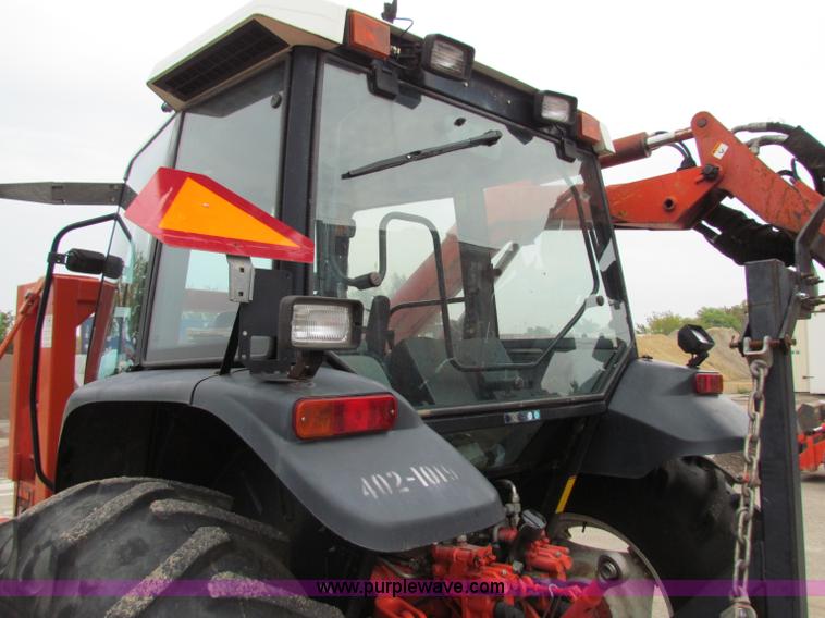 image for item E4150 2000 New Holland TS100 tractor