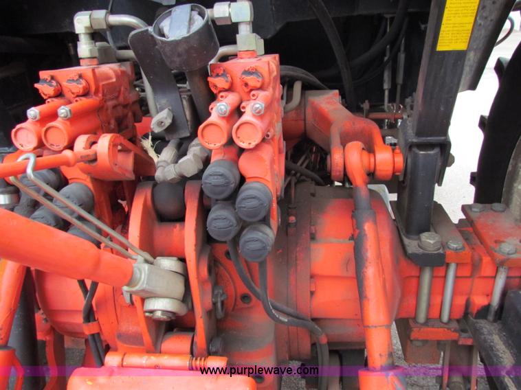 image for item E4150 2000 New Holland TS100 tractor