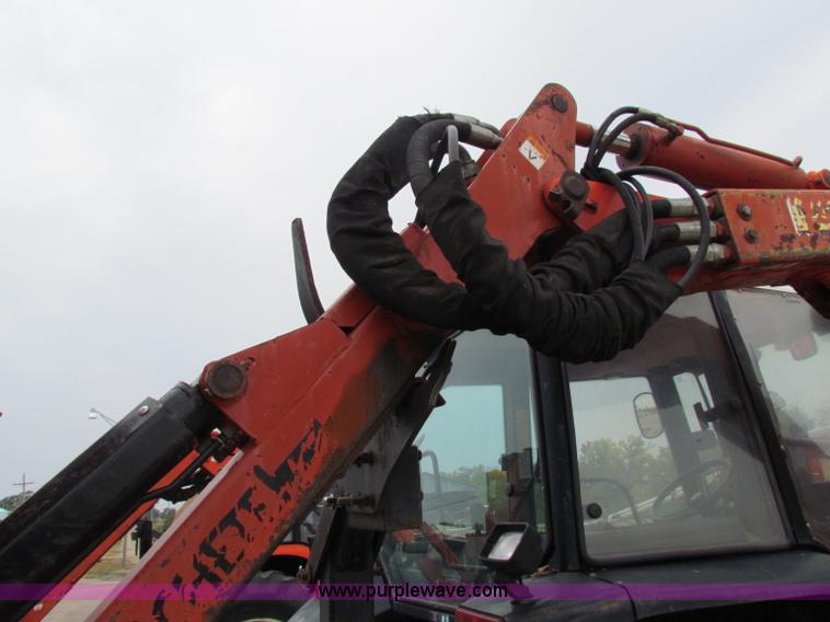 image for item E4150 2000 New Holland TS100 tractor