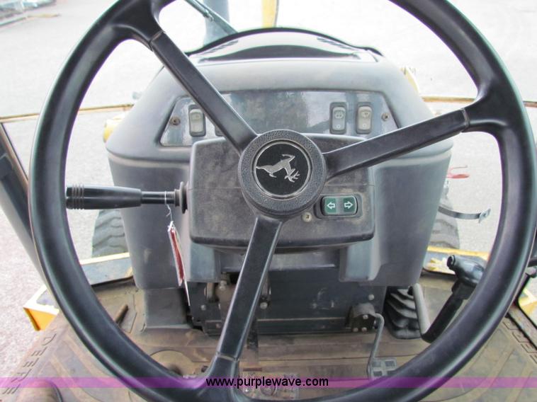 image for item E4165 2003 John Deere 310G backhoe