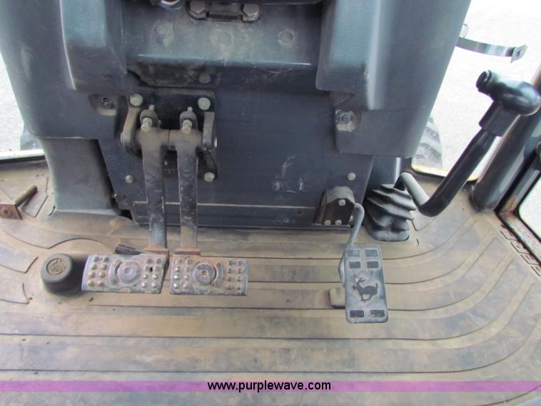 image for item E4165 2003 John Deere 310G backhoe