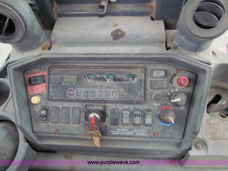 image for item E4165 2003 John Deere 310G backhoe