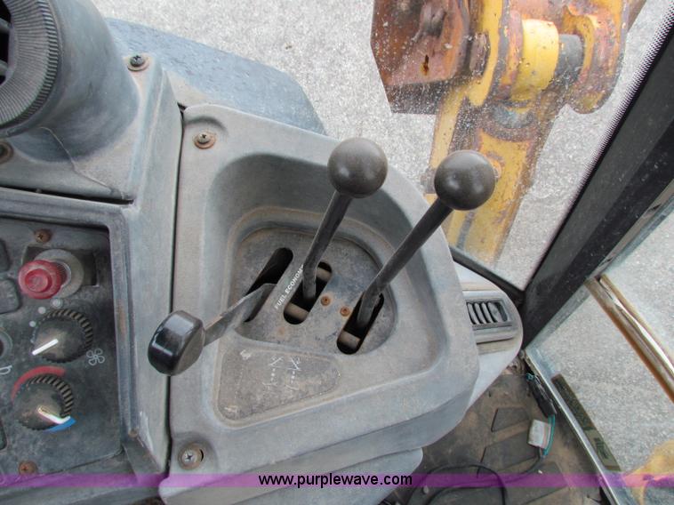 image for item E4165 2003 John Deere 310G backhoe