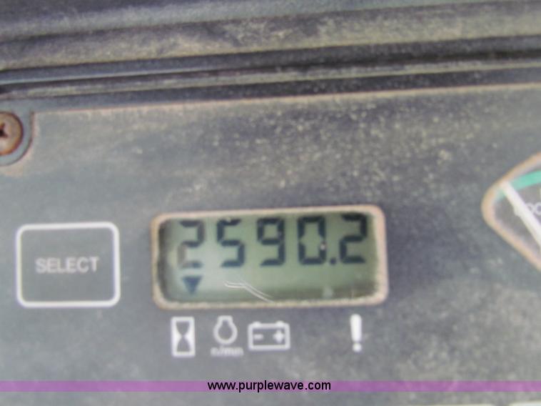 image for item E4165 2003 John Deere 310G backhoe