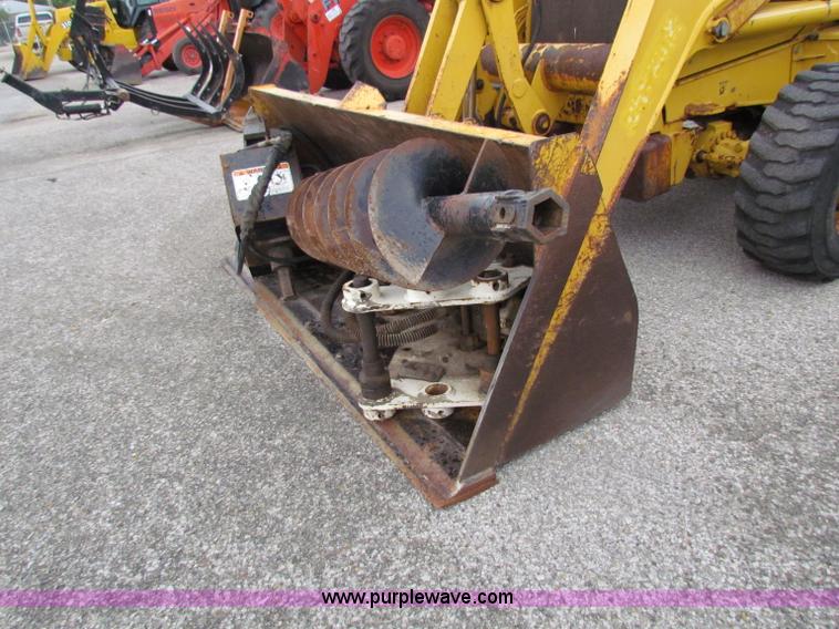 image for item E4165 2003 John Deere 310G backhoe