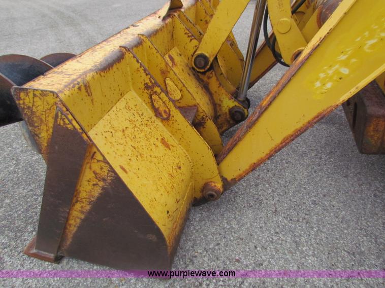 image for item E4165 2003 John Deere 310G backhoe
