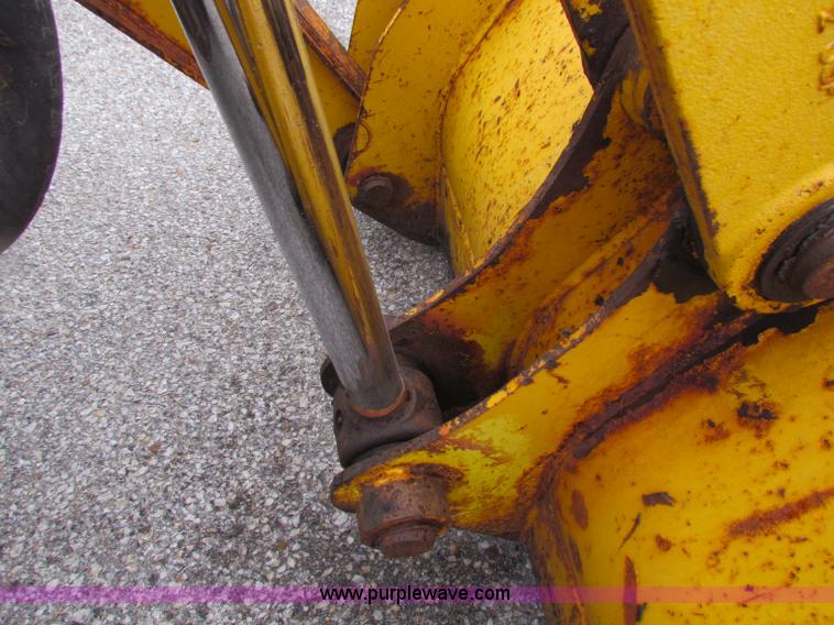 image for item E4165 2003 John Deere 310G backhoe