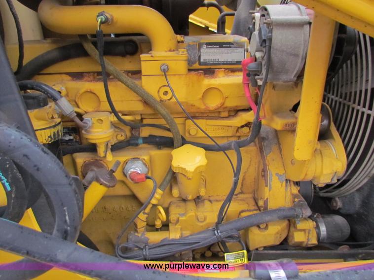 image for item E4165 2003 John Deere 310G backhoe