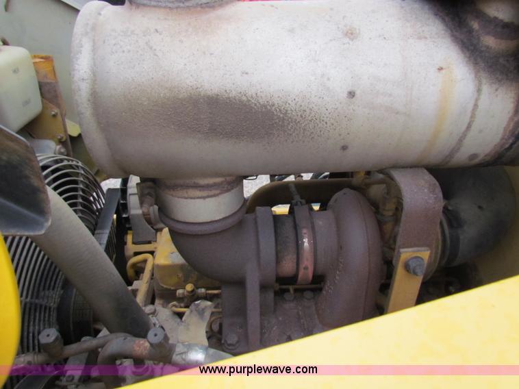 image for item E4165 2003 John Deere 310G backhoe