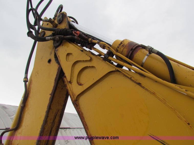 image for item E4165 2003 John Deere 310G backhoe