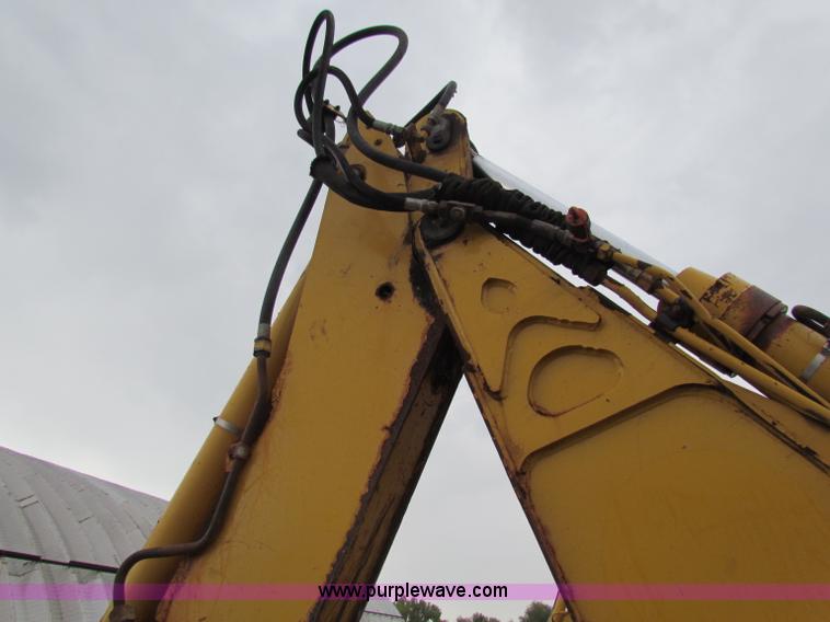 image for item E4165 2003 John Deere 310G backhoe