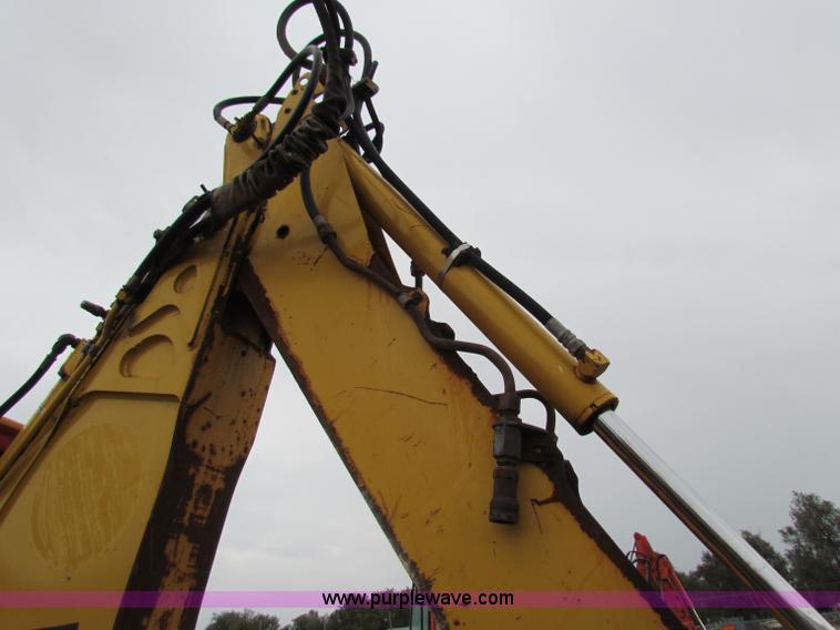 image for item E4165 2003 John Deere 310G backhoe
